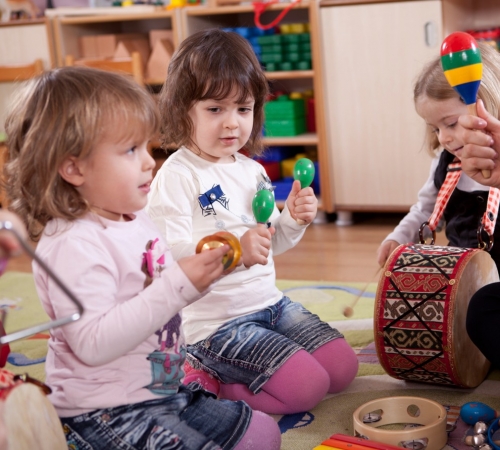 Pre-Kindergarten children enjoying music